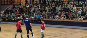 a group of people in a sports hall